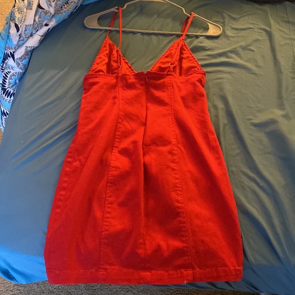 Red Strapless Skinny Dress with Cross Hatches Along The Sides - Picture 6 of 7